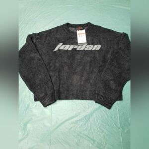 The NWT Jordan Women’s Sport Sweater in size L